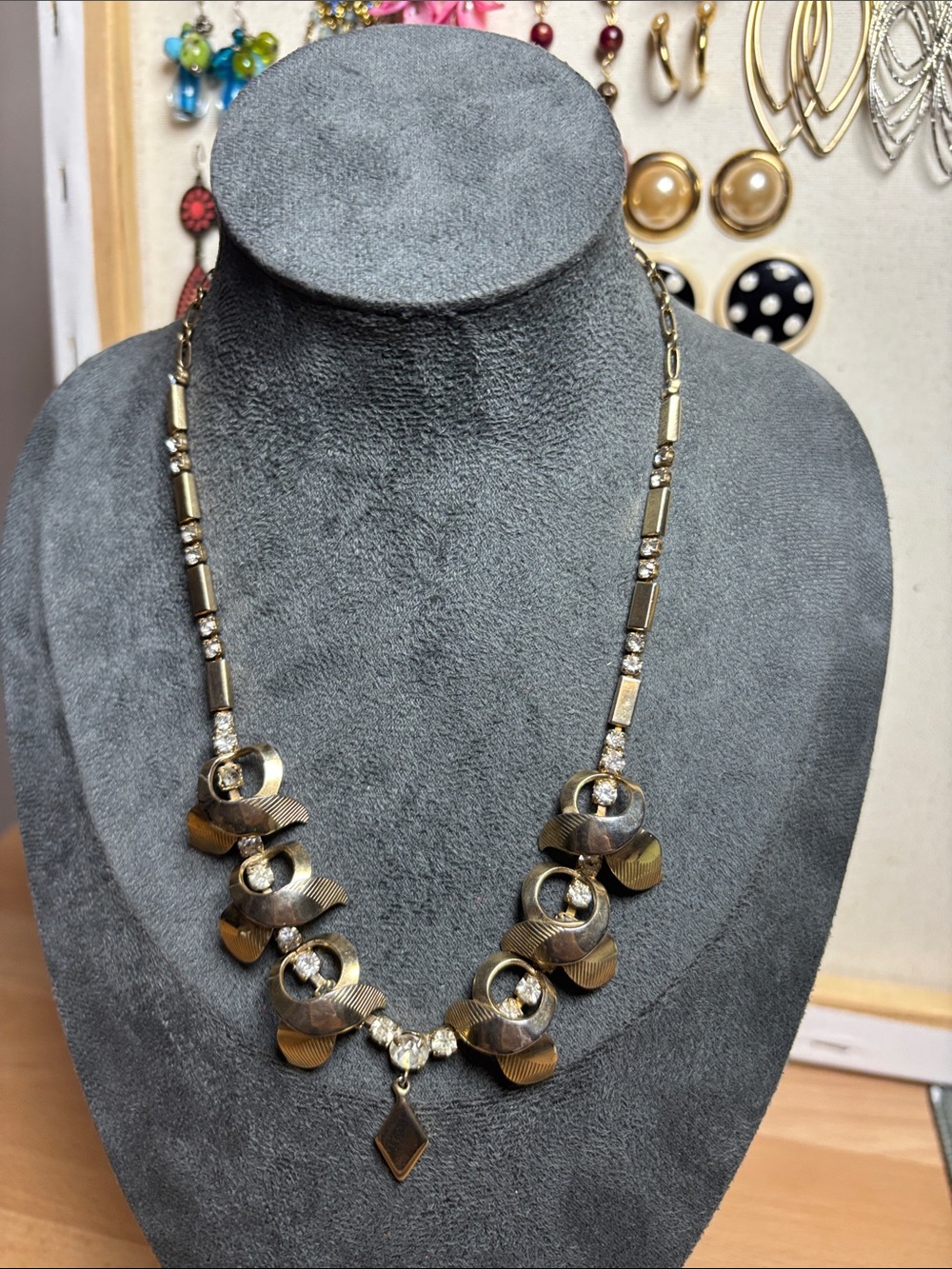 Vintage Gold Tone Sculptural rhinestone necklace with diamond pendant